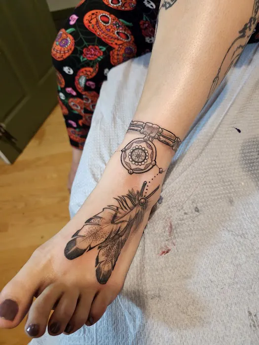 717 Tattoo, Body Piercing, & Tattoo Removal Studio 4 0