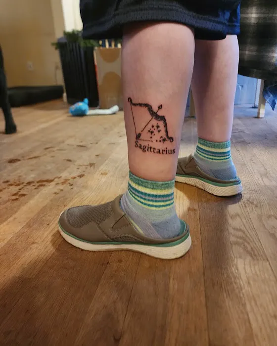 Spilt Milk Mooncusser Tattoo and Laser Tattoo Removal 0