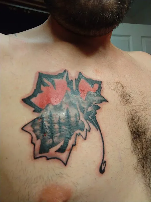 Promethean Tattoo and Body Piercing 6