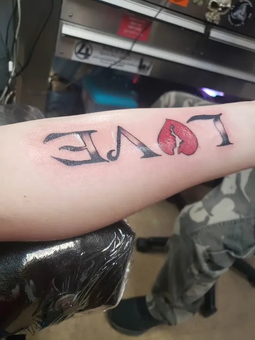 Poundtown Tattoo 0