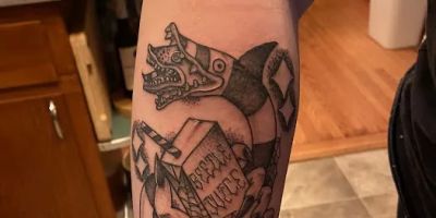 Pins and Roses Tattoo