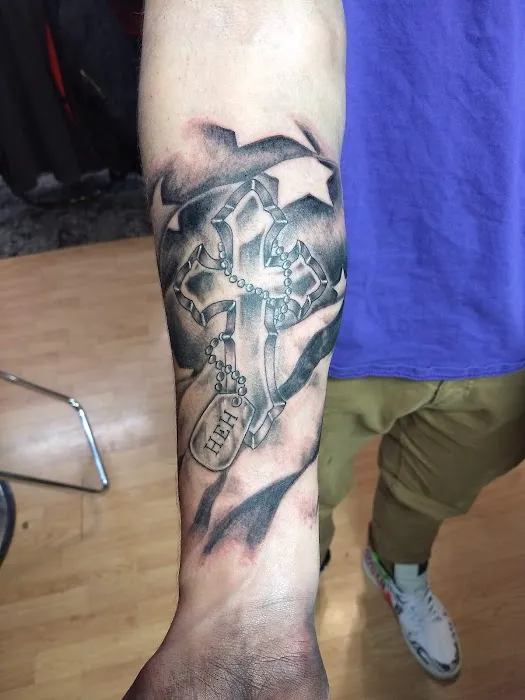 Phat Joe's Drop of Ink Tattoos and Piercing 0
