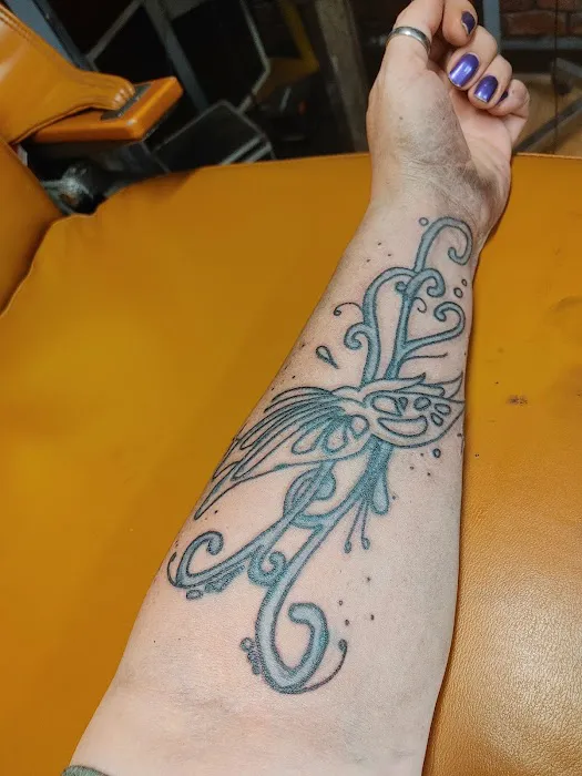 Phat Joe's Drop of Ink Tattoos and Piercing 8