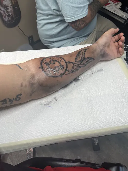 Minerva's Quill Tattoo 7