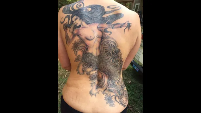Utopian tattoo and body piercing 5