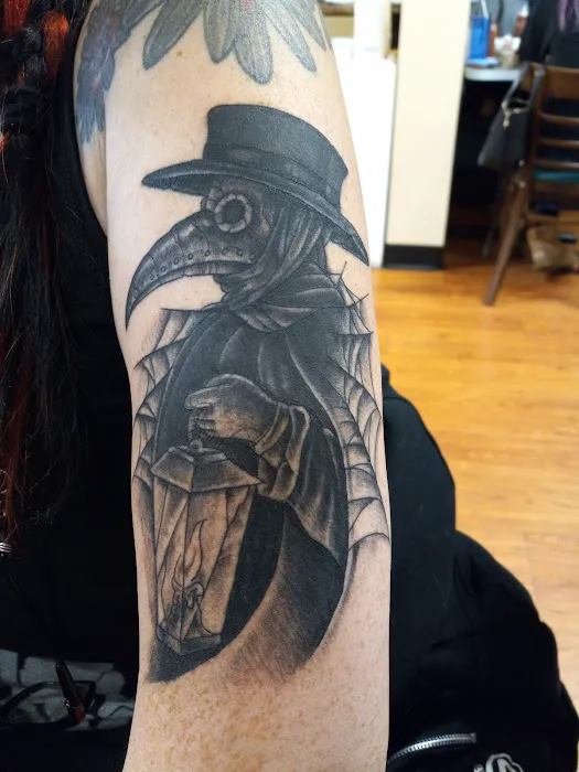 CowPok Piercing + Tattoo Gallery 0