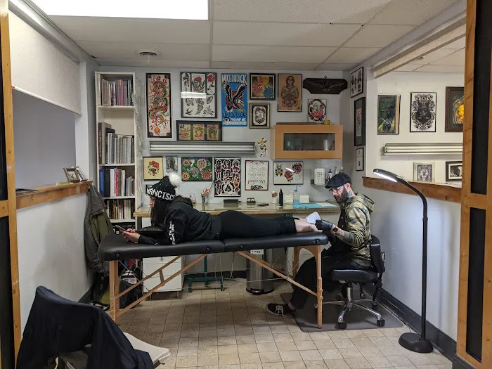 CowPok Piercing + Tattoo Gallery 5
