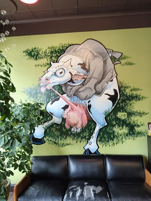CowPok Piercing + Tattoo Gallery 1