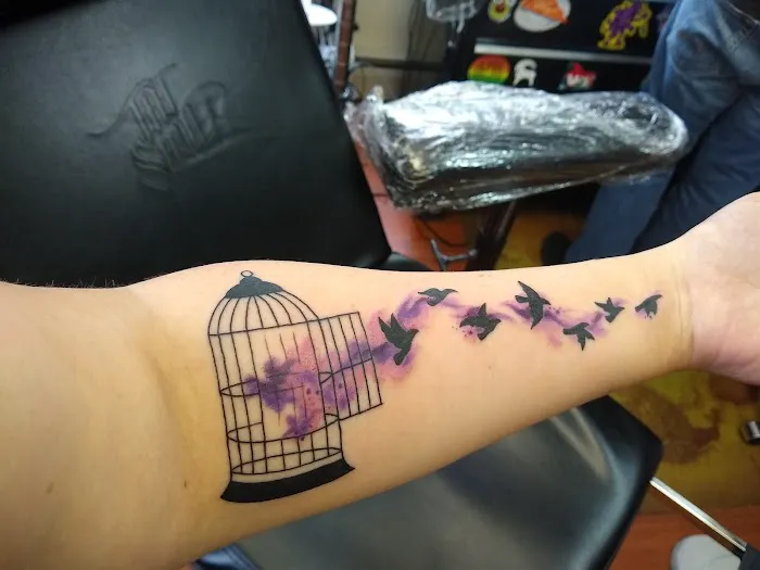 Vivid Skin Tattoo 0