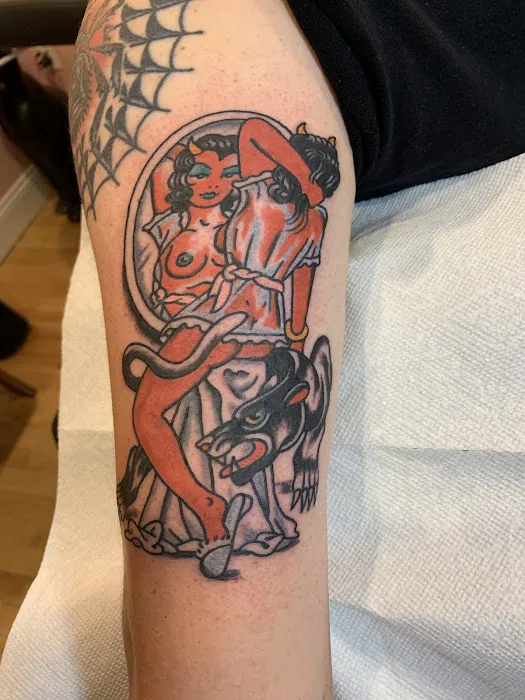 Gold Star Tattoo 2