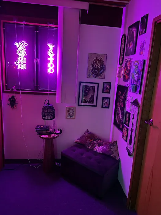 Cryptid's Den Tattoo 0