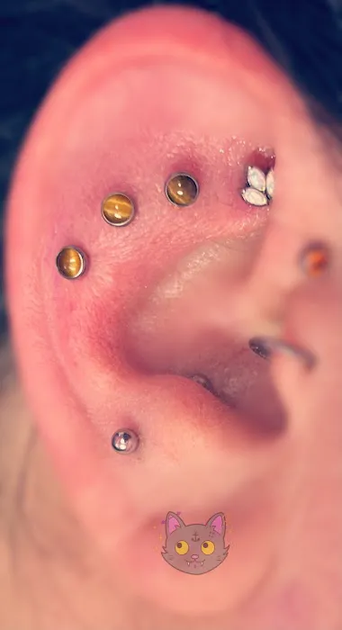 Tat’s Quick ‘N Slick Piercing Parlour 8