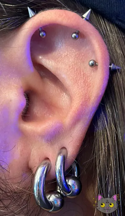 Tat’s Quick ‘N Slick Piercing Parlour 0