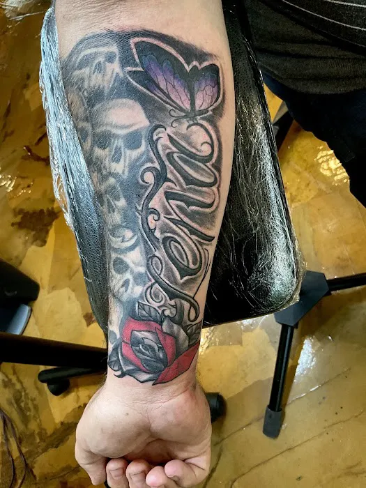 The Emerald Rose Tattoo and Fine Arts 1