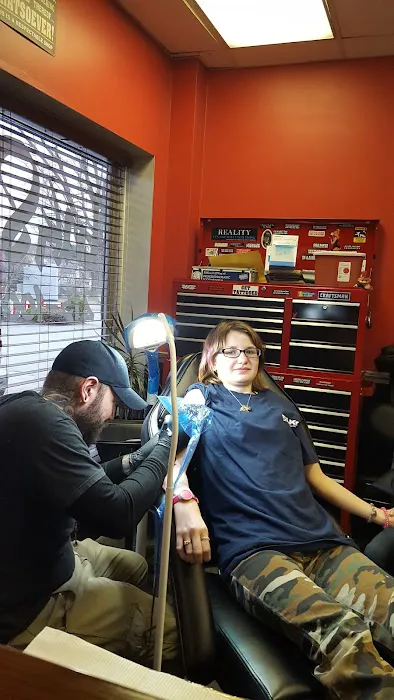 InkSlingrz Professional Tattoos and Body Piercing 3