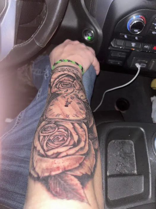 Stained & Adorned tattoos and body piercing 2