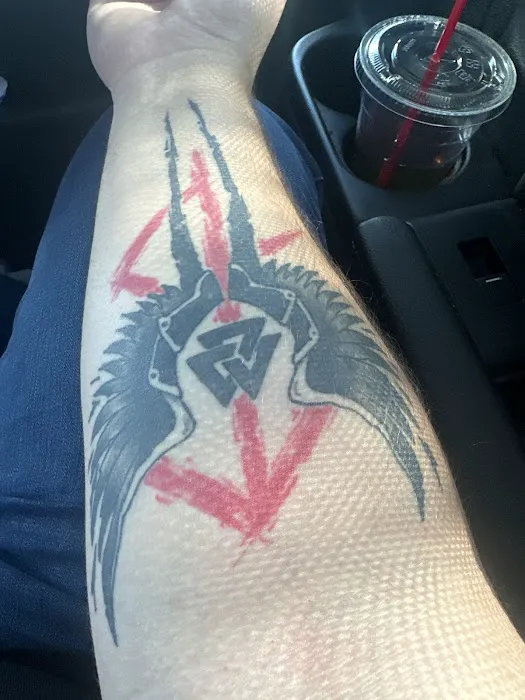 Stained & Adorned tattoos and body piercing 9