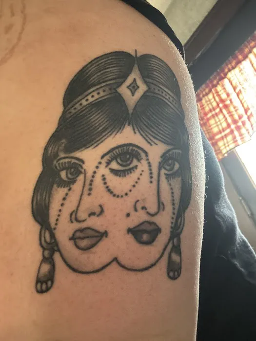Stained & Adorned tattoos and body piercing 7