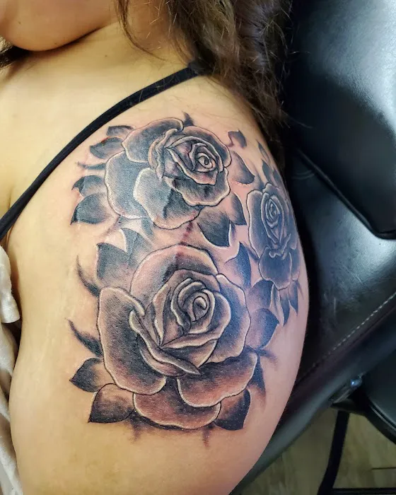 Scotty Rock's Ink Slingers Tattoo Studio 0