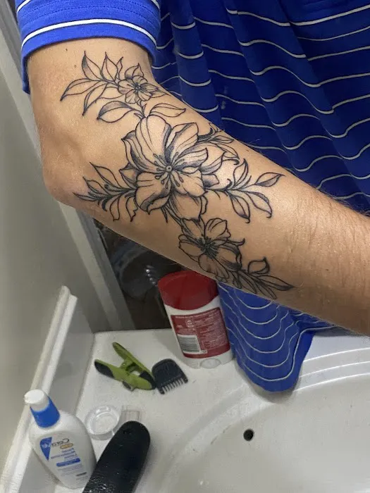 Mystic Tattoo and Body Piercing 0
