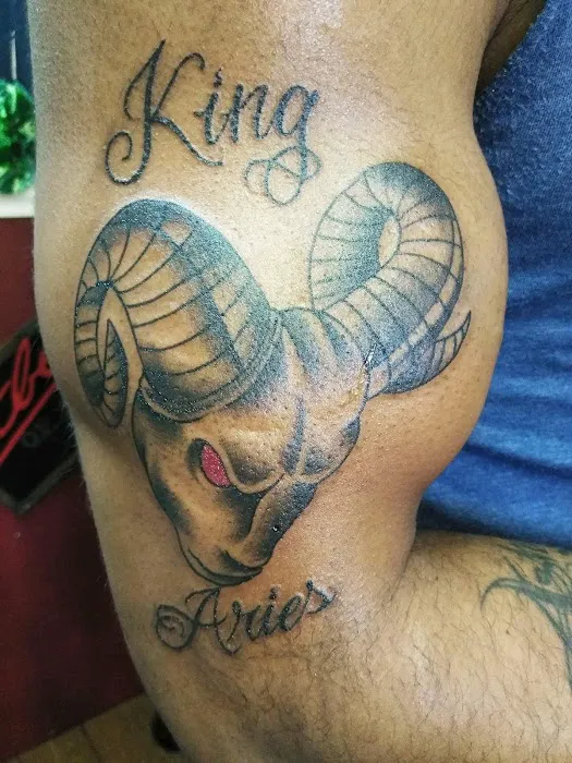 Sacred Art Tattoo & Body Piercing 9