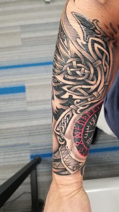 Sacred Art Tattoo & Body Piercing 3