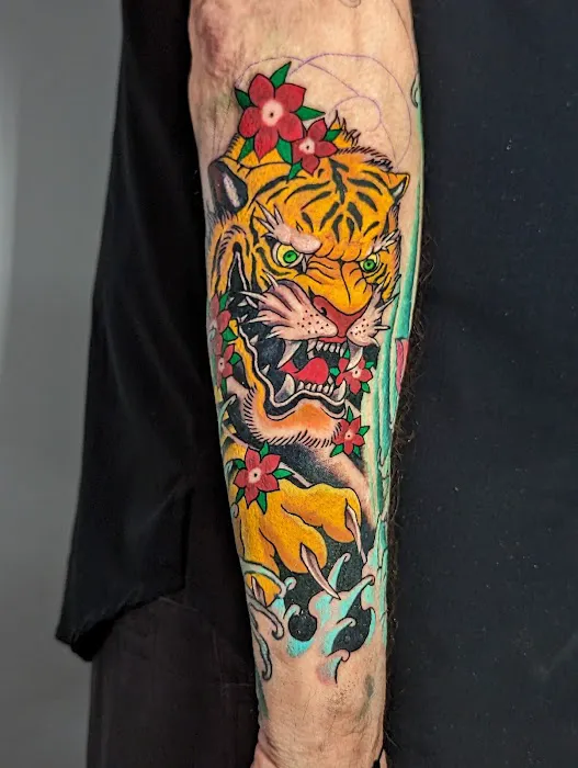 Sacred Art Tattoo & Body Piercing 8