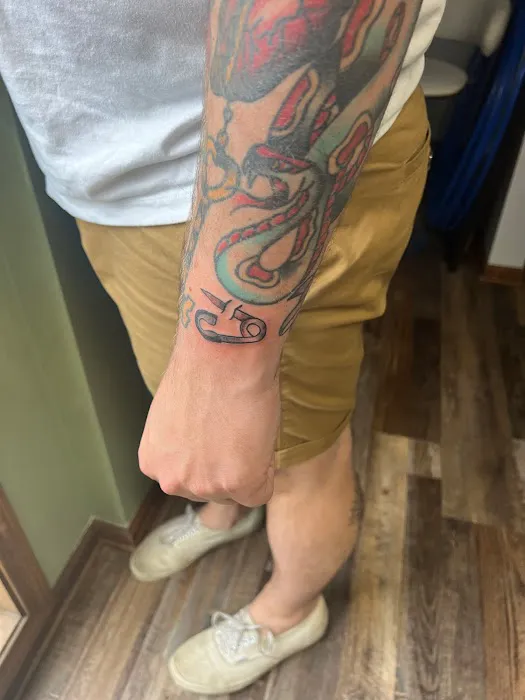 The Yellow Daisy Tattoo Studio 0