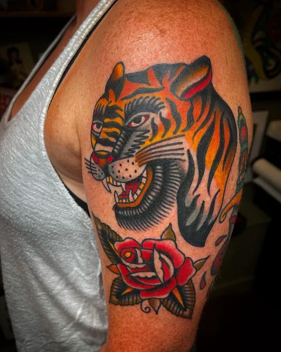 Gold Cross Tattoo Co. 8