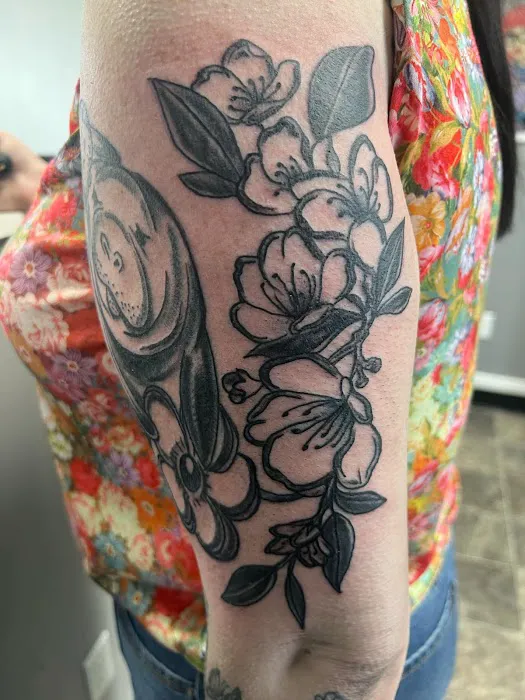Enchanted Rose Tattoo Parlor 1
