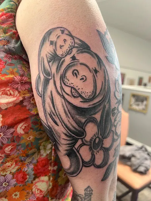 Enchanted Rose Tattoo Parlor 0