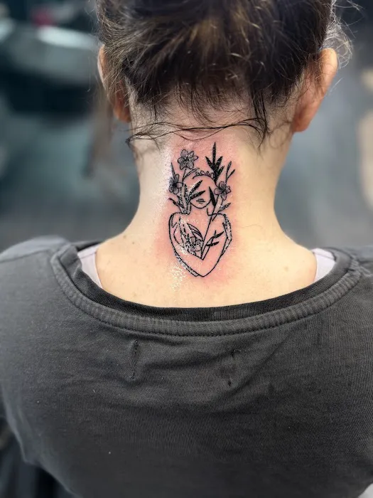Doe Tattz & Piercing Shop 0