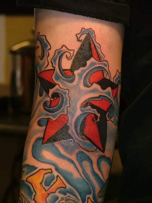 Iron Cutter Tattoo & Piercings 2
