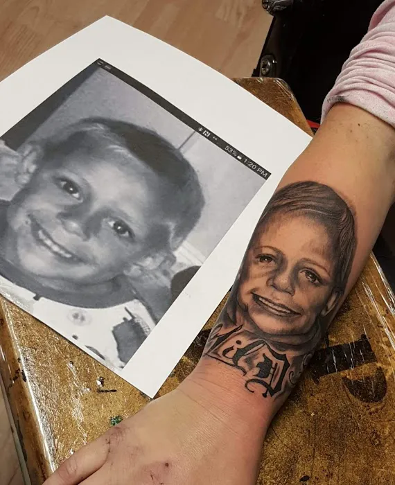 T.R.A.P. Ink Tattoos and Piercings 8