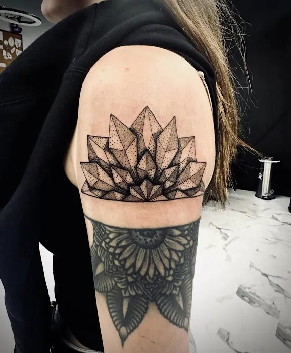 Don't Tell Mom DTM Piercings And Tattoos LLC 2