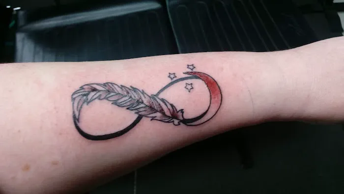 Evolved Artforms Tattoo 0