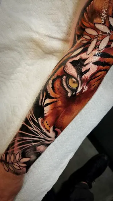 Now Or Never Tattoo Studio 0