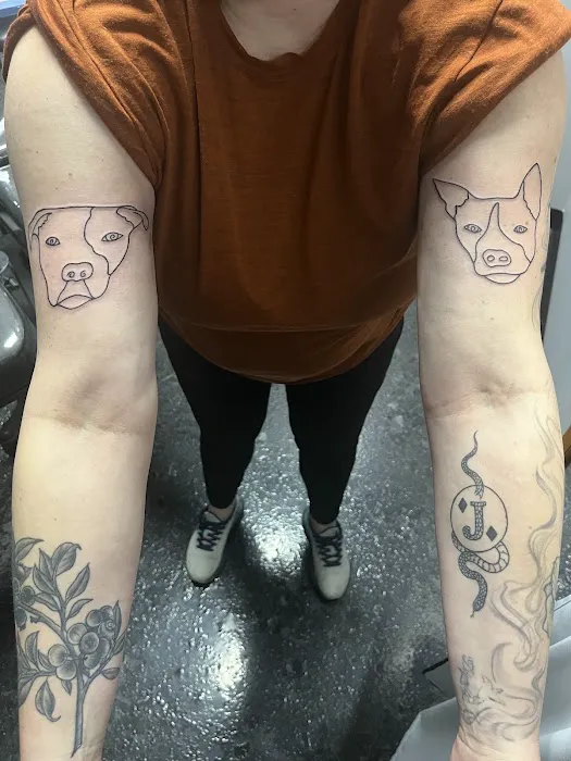 Mystic Knot Tattoo & Body Piercing 1