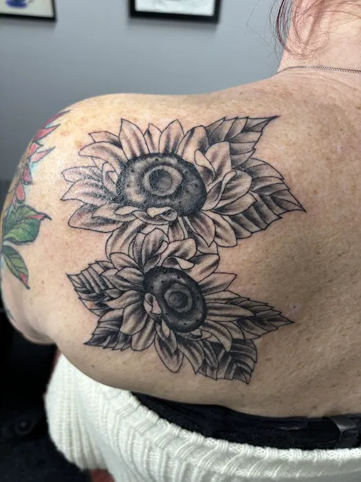 Mystic Knot Tattoo & Body Piercing 2