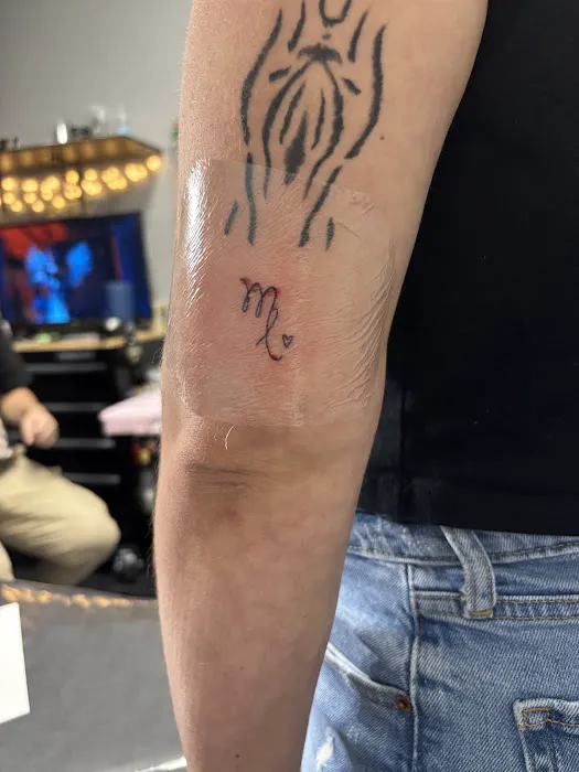 Mystic Knot Tattoo & Body Piercing 6