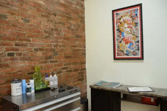 Omega Red Piercing & Tattoo 3