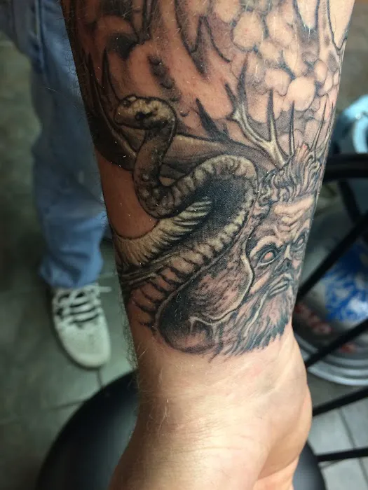 Revolution Studios tattoo 1