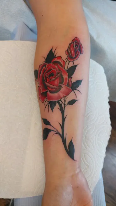 Grinn & Barrett Tattoo 1