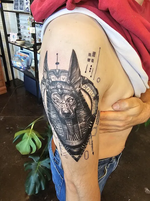 Caffeinated Caterpillar Tattoo Spa 0