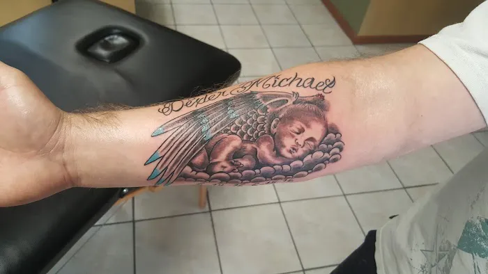 Nebraska Electric Tattoo Company 6