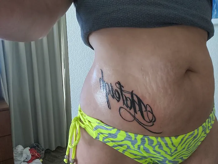 Head 2 Toe Tattoo & Body Piercing 5