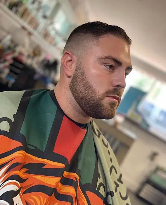 The Tattooed Barber 0