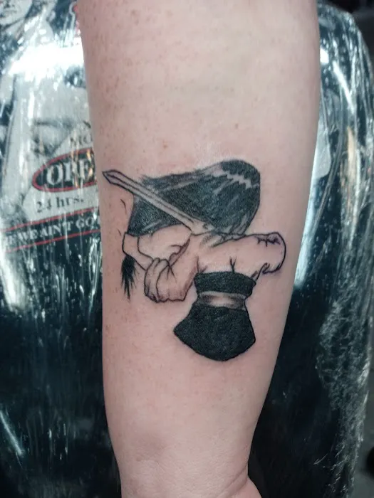 The Railroad Ave. Social Club, Tattoo Studio 8