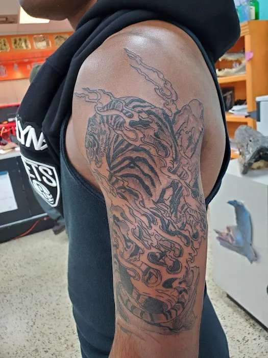 Mid City Voodoux Tattoos 0