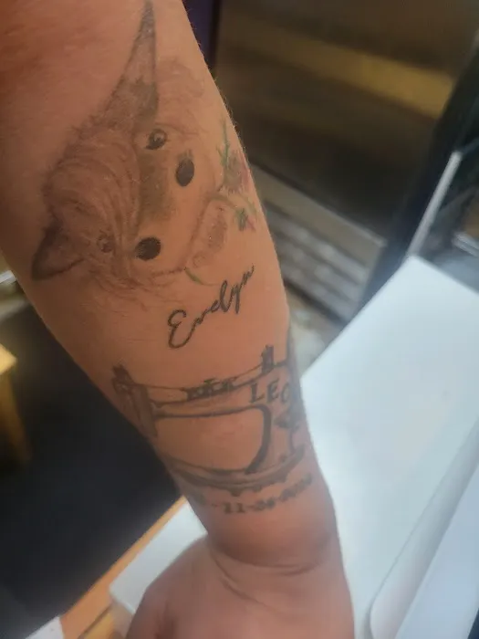 Smiley Tattoo LLC 1
